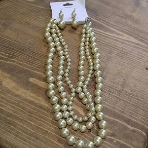 Cream simulated pearls earring and necklace